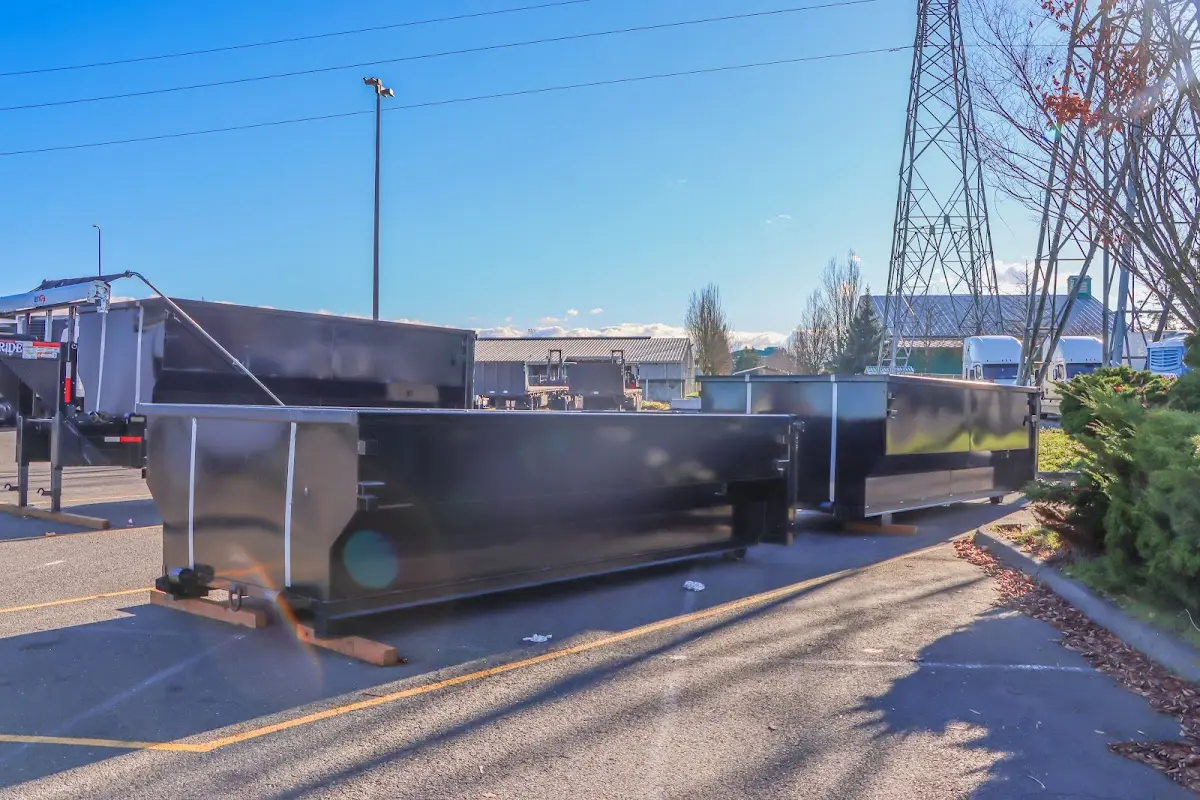 Roll-off dumpster ready for waste disposal at job site for 8 Yard Dumpster Rental in Adel